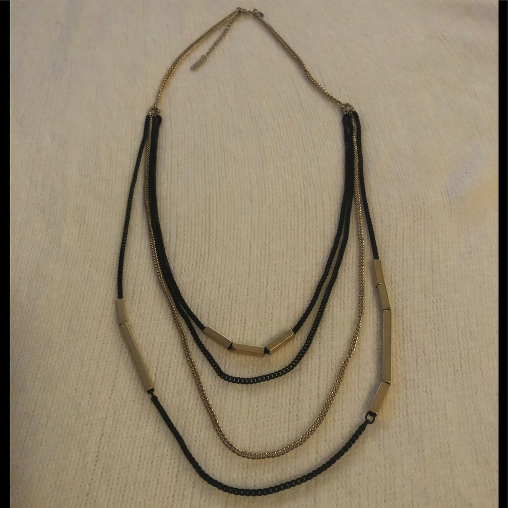 Multi-layered gold/black necklace